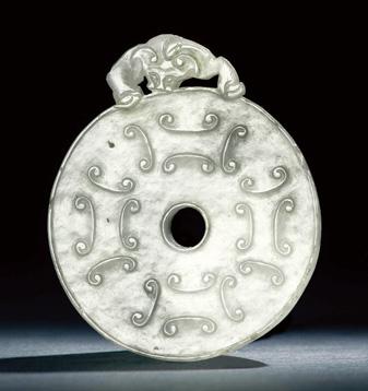 Property from a Distinguished Hong Kong Collector 1468 AN OPENWORK WHITE JADE MYTHICAL BEAST PLAQUE Jin/Yuan Dynasty (1115-1368) 7.5 cm. (3 in.