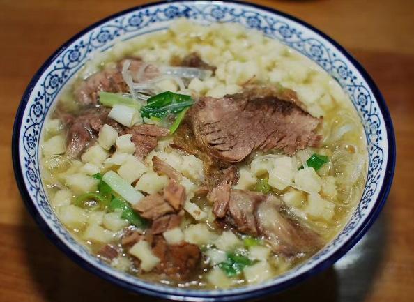 A 羊肉泡馍 XiAn Paomo Soup Lamb PaomoSoup $16.8 Add Pita Bread $2 加坨坨馍 $2 Paomo is the most famous food in Xi An.