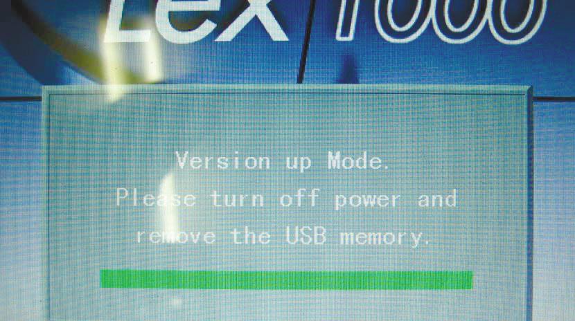4) When the files in the USB flash drive are listed on the display, select the copied main program with or, then press. 5) When the confirmation message appears, press.