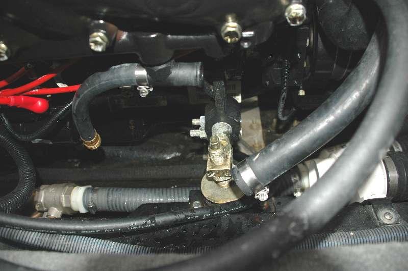1.1.2 Port side 1. Decouple hose connecting port and starboard exhaust manifolds. Drain water from both sides. 2.